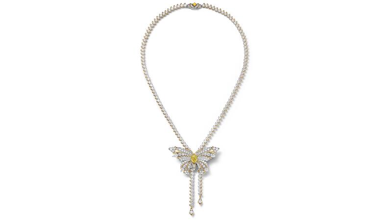 A “Butterfly” necklace in platinum and 18-karat yellow gold accented with round white diamonds and yellow diamond on the clasp. The pendant depicting a butterfly centers on a 2.18-carat oval-cut fancy vivid yellow diamond and can become a brooch (price upon request) Tiffany & Co. Blue Book 2026: Hidden Garden Butterfly Fancy Vivid Yellow Diamond Pendant